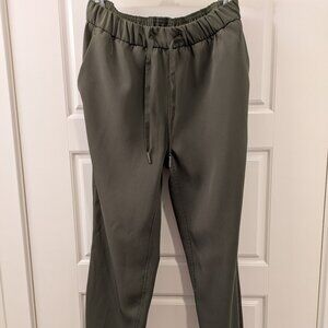 Women's olive green AVIA joggers, 100% polyester, size XS
